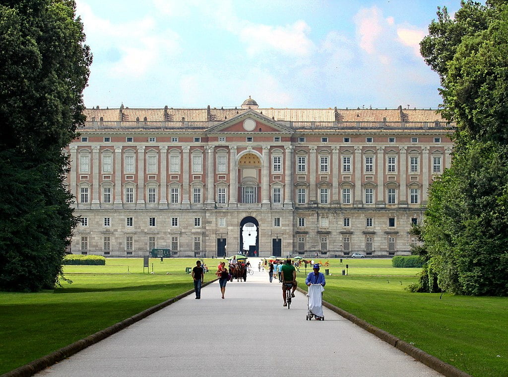The grand lawn and facade of the Royal Palace of Caserta.