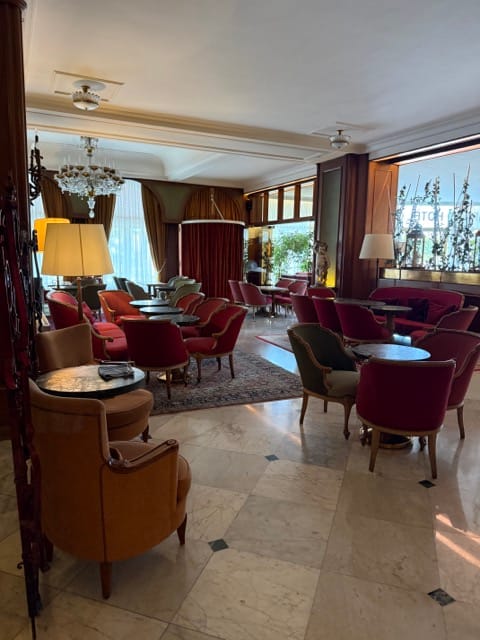 Vintage salon and seating area inside Grand Hôtel Cravat