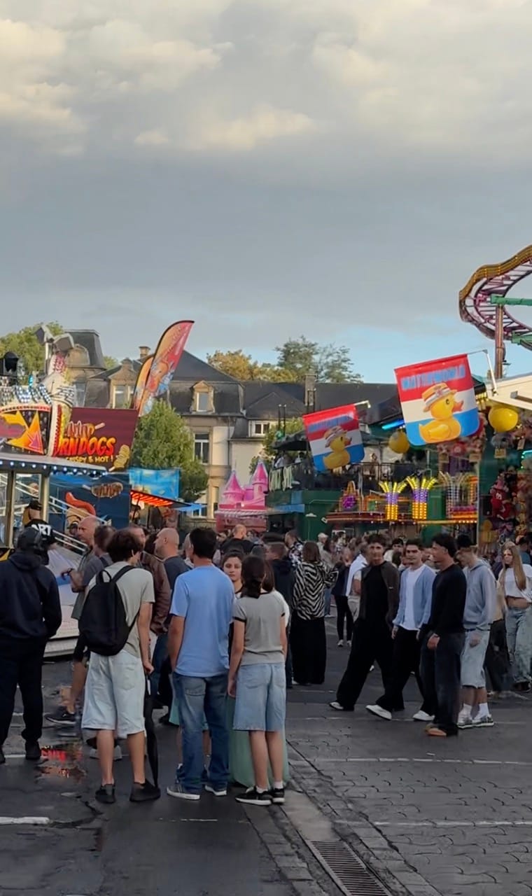 Crowds and amusement rides at the Schueberfouer fair in Luxembourg City